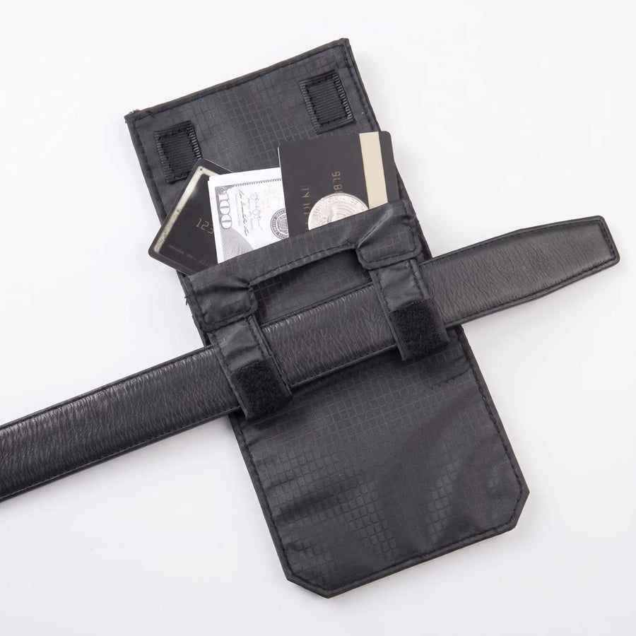 A black belt pouch wallet with a textured finish, shown open with a passport and a dollar bill tucked inside. The pouch is secured with a matching black belt strap, photographed on a clean white background.
